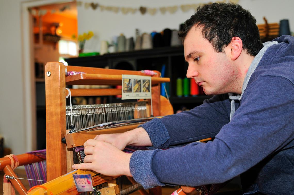 Boy weaving