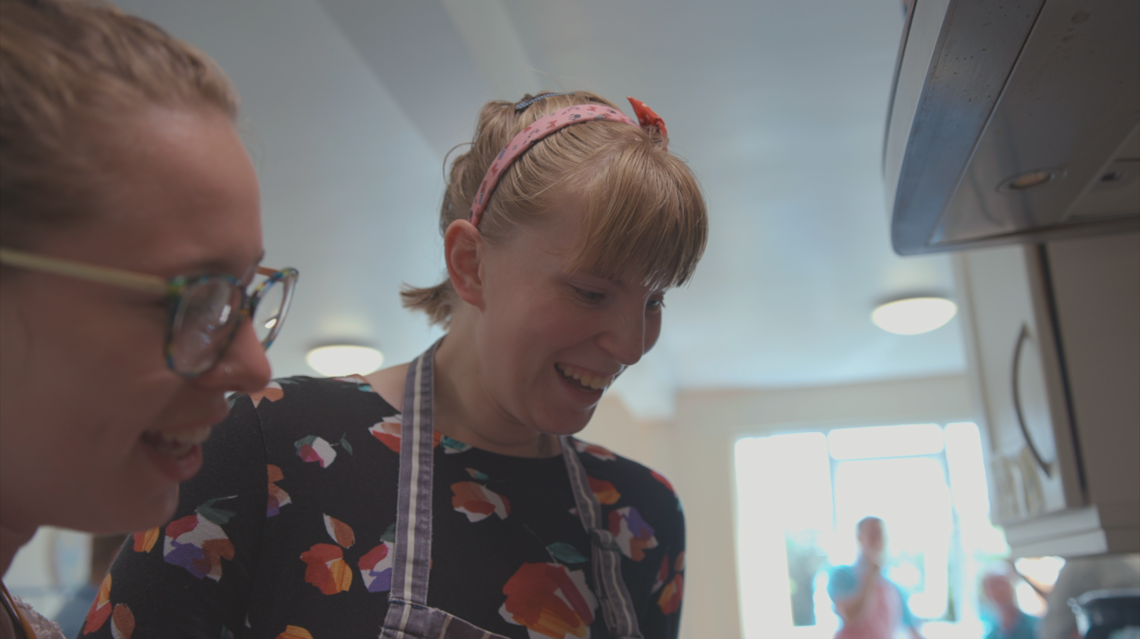 Girl and lady cooking.