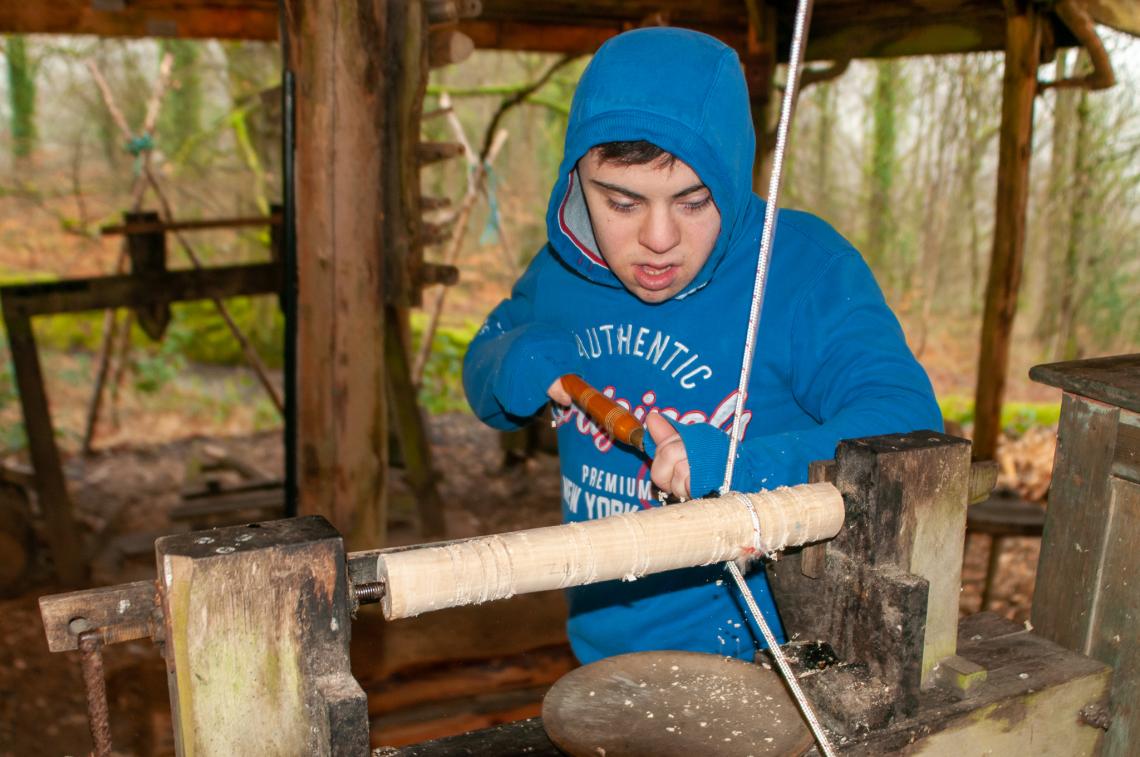 Boy doing green woodwork 