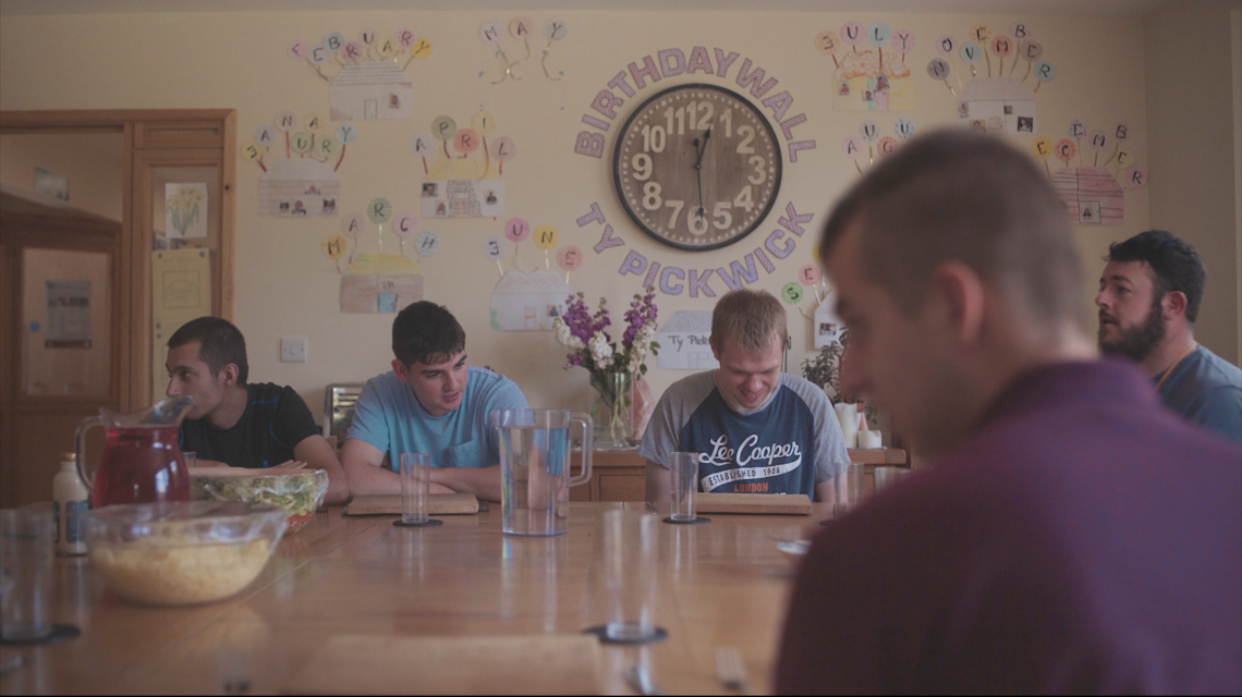 Group eating together around a table.