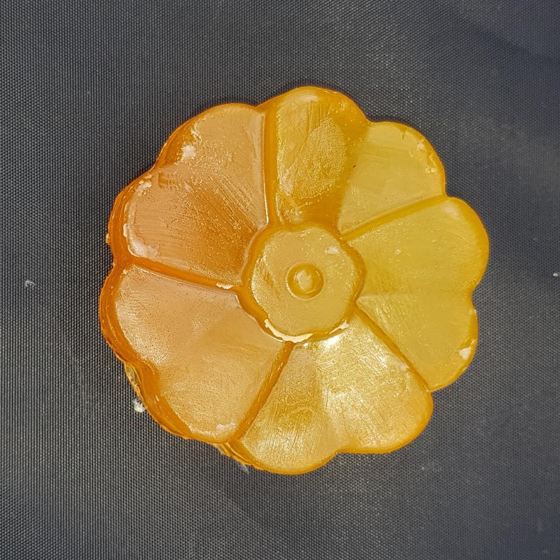 Grapefruit smoothie soap in the shape of a flower.