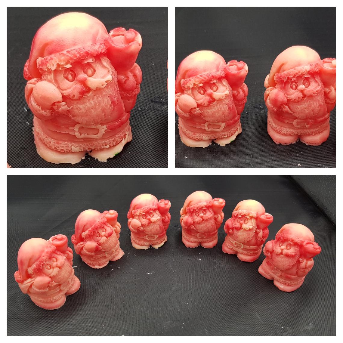 A close up of santa soaps.