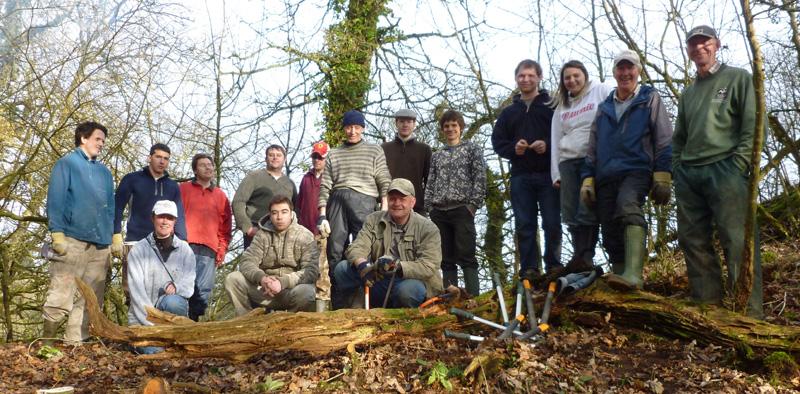 Victoria House residents and volunteers in the woods.