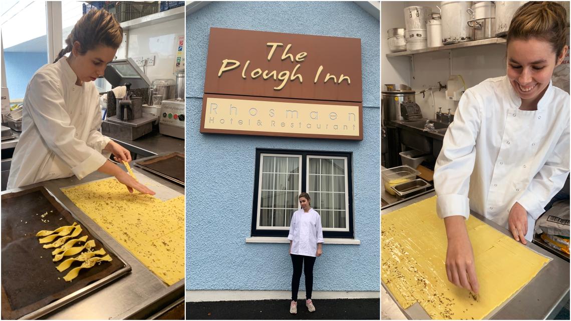 Girl having work experience in the Plough kitchen.