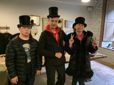 Wearing top hats in Newton House