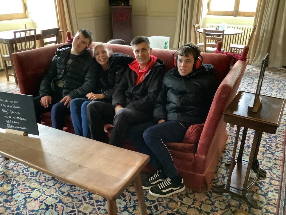 learners sitting on a sofa from the set of Downton Abbey