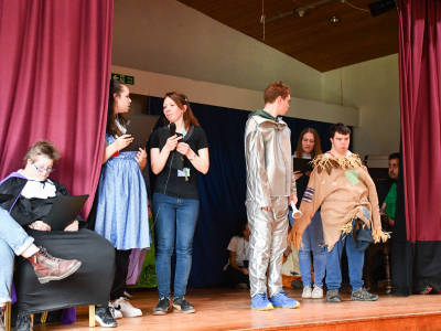 Learners on stage