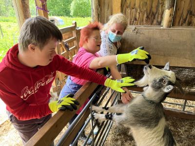 Learners with pygmy goat